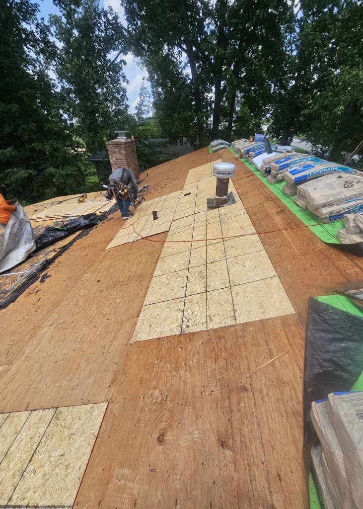 Roof decking repair and re-sheeting during East Brainerd roof replacement