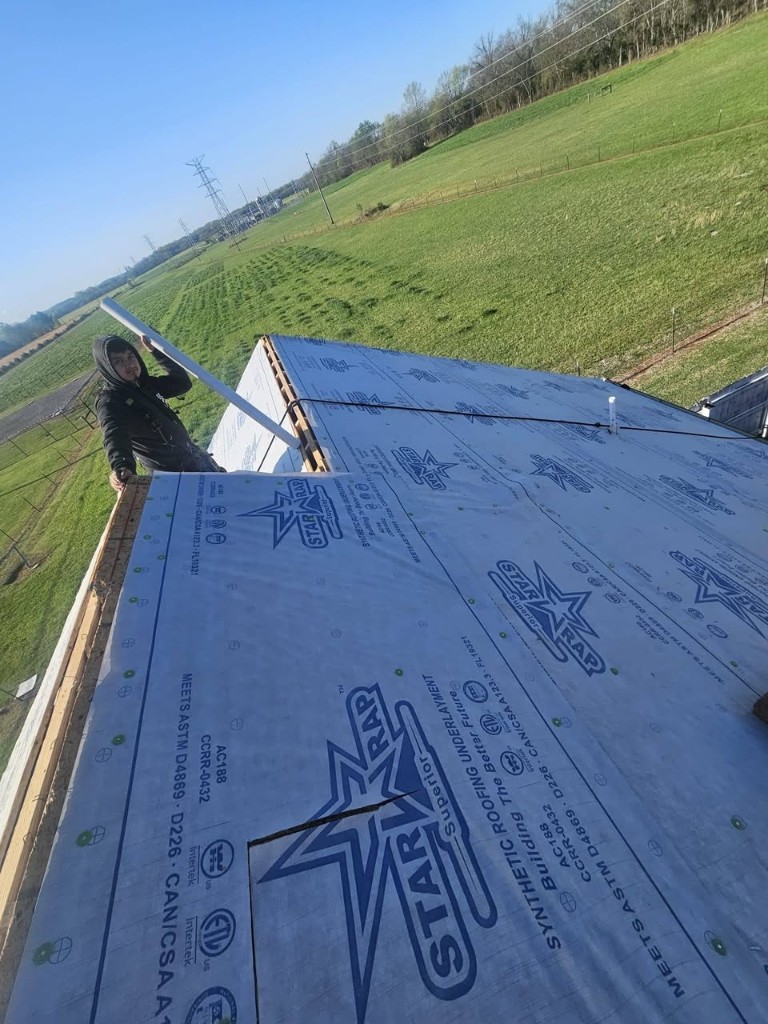 Synthetic roofing underlayment installed during residential roof replacement