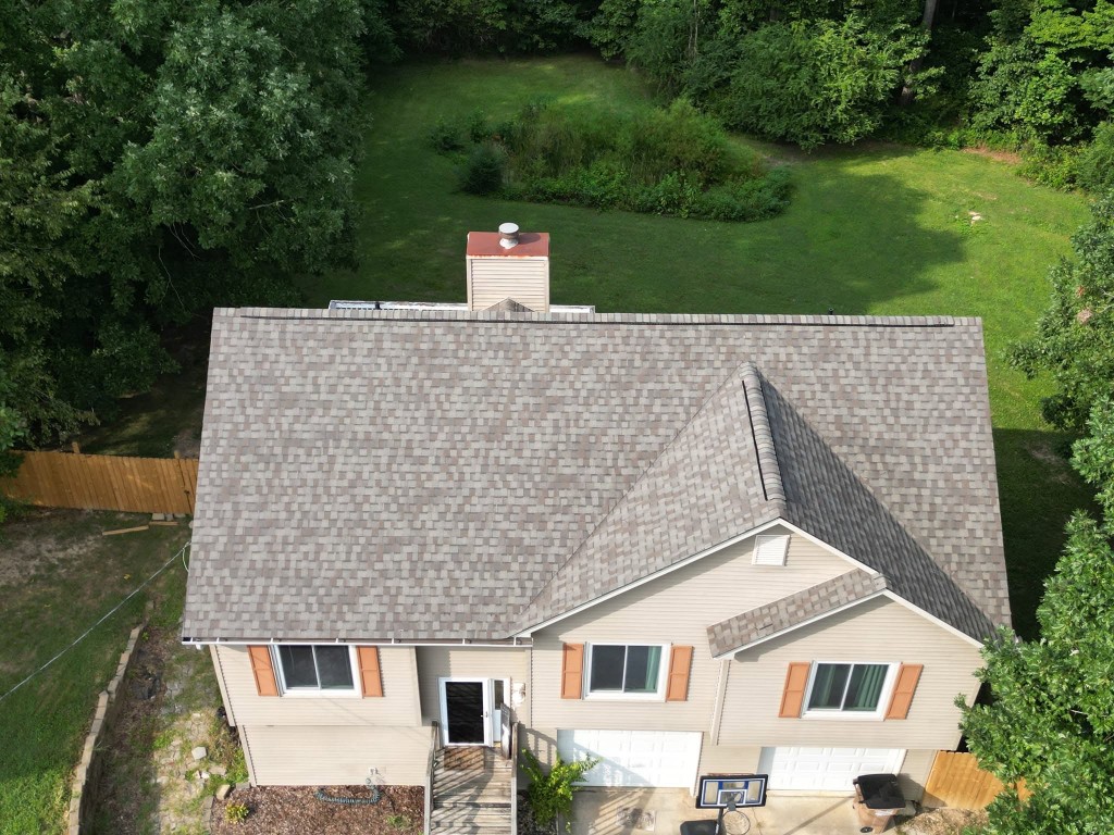 Finished front view of home with completed Weathered Wood roof